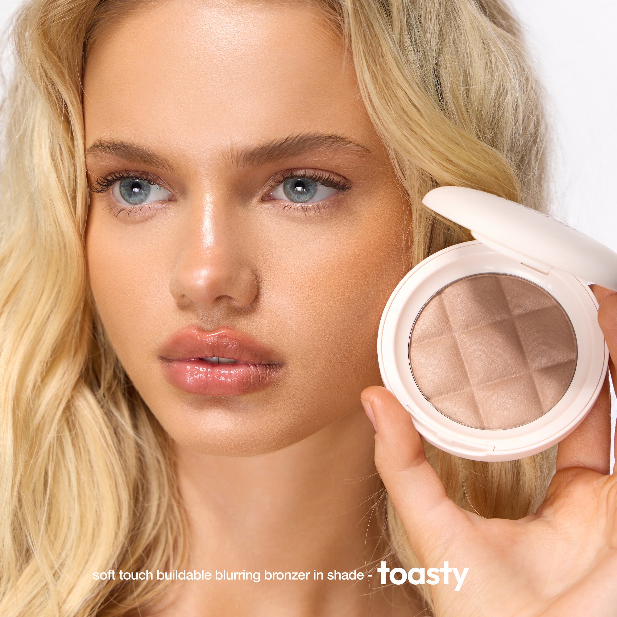 colour_Toasty, | ICONIC London Fridays Buildable Blurring Bronze. Model wearing bronzer